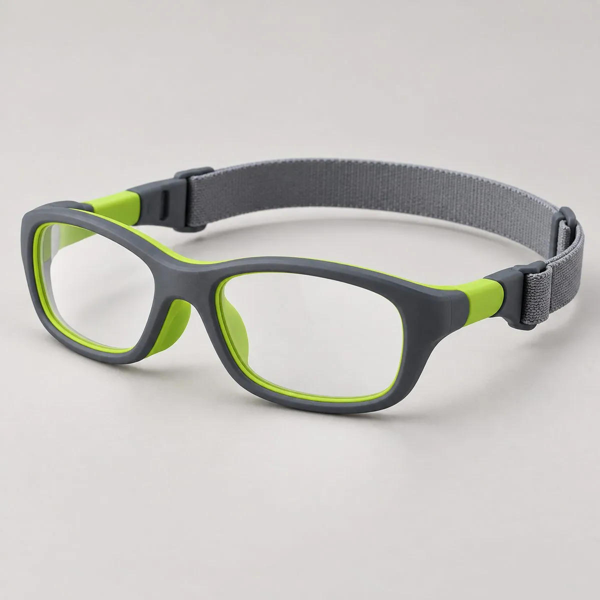 Occhiale sportivo per bambini in gomma grigia e lime con fascia regolabile Occhiale sportivo per bambini in gomma grigia e lime con fascia regolabile