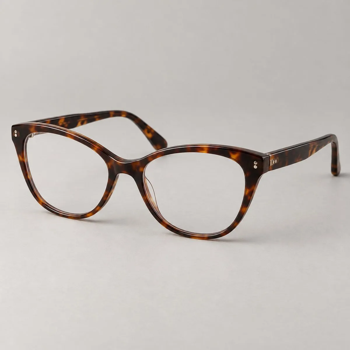 Montatura da vista cat-eye in acetato tartaruga scuro con lenti trasparenti Montatura da vista cat-eye in acetato tartaruga scuro con lenti trasparenti