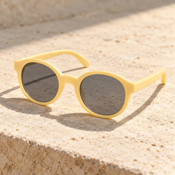 Occhiali da sole per bambini giallo tenue con lenti grigie
